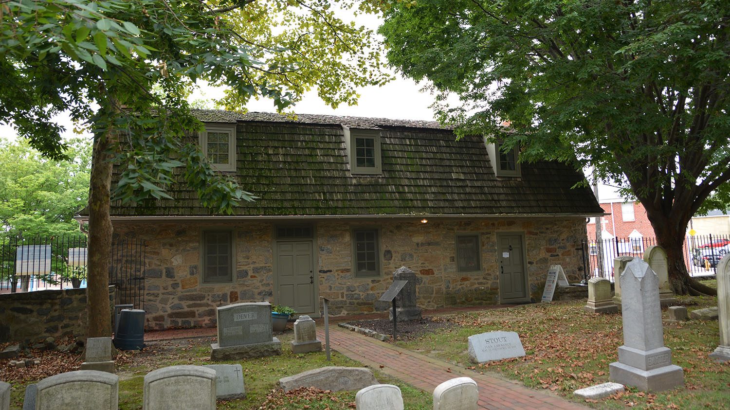 The Hendrickson House at Old Swedes viewed from the graveyard.